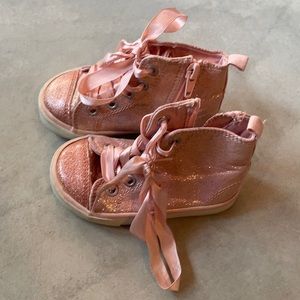 Pink high top sneakers